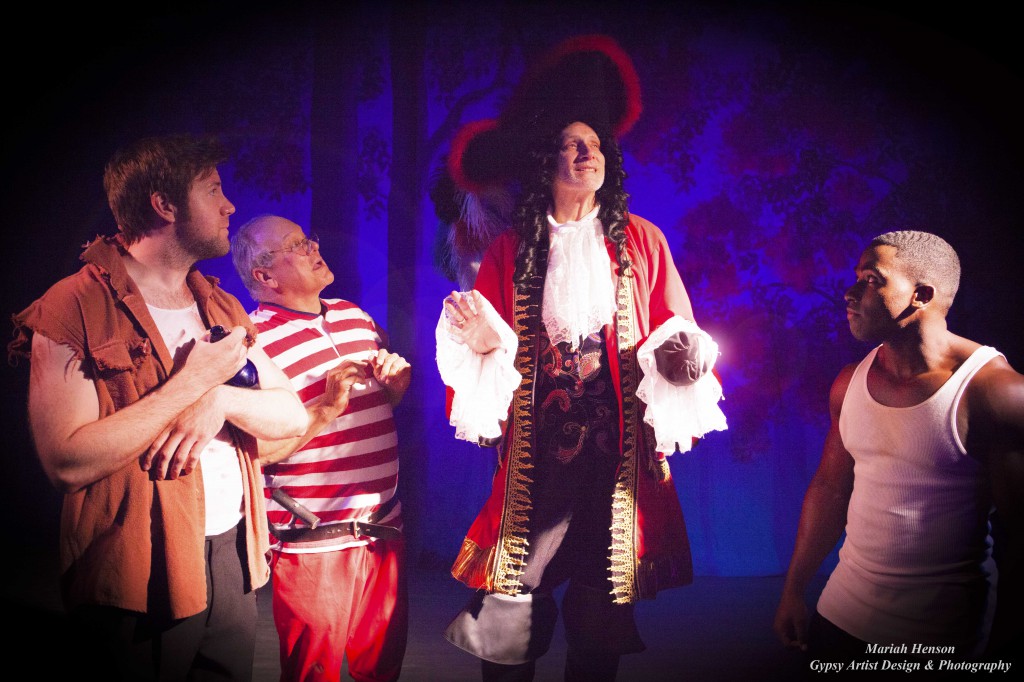 Captain Hook played by David  Edwards sings of his terrible plans to kill Peter to Smee played by Richard  Privitt and his pirate crew Keeg (1)